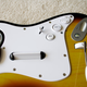 Illustration for article titled Rock Band 2 Wireless Guitar and Drums Hardware Review